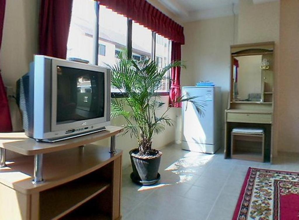 Billabong Hotel Pattaya Quarto foto